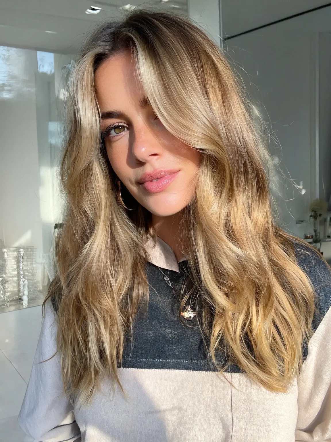 Long Layered Waves with Sandy Blonde Balayage